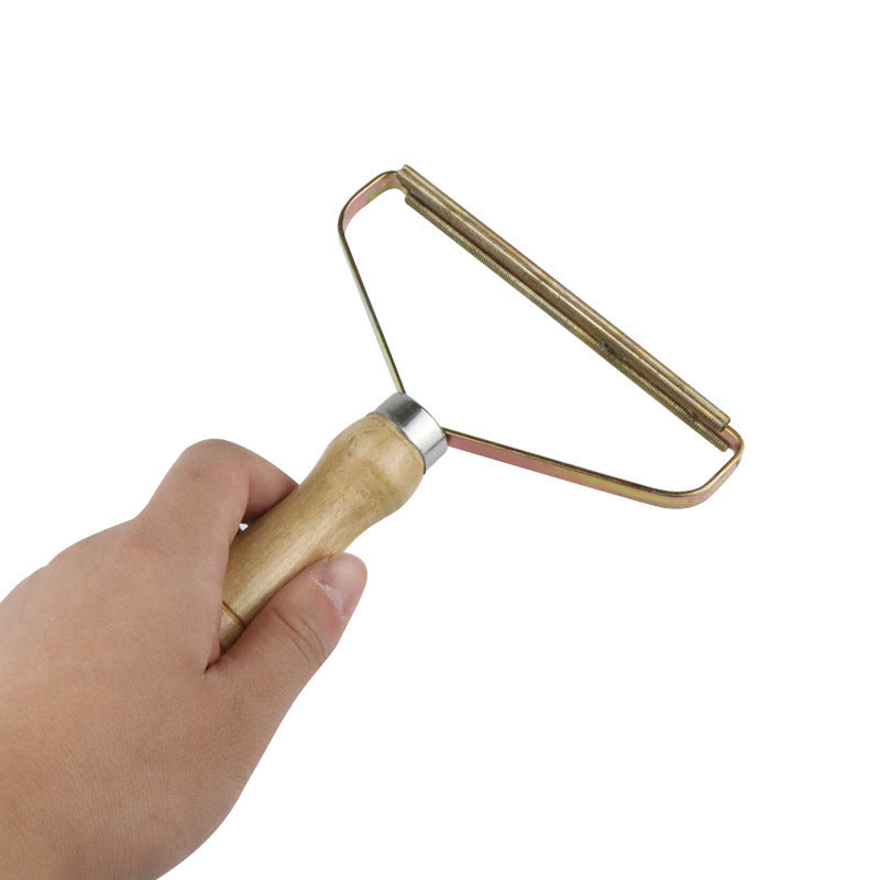 Wooden manual lint remover