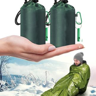 Thermal emergency sleeping bag liner with whistle
