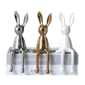 Decorative ceramic sitting rabbit statuette