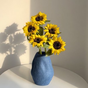 Faux blooming sunflower stem